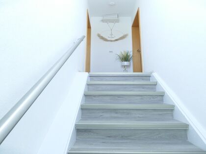 Treppe zu den Ferienwohnungen